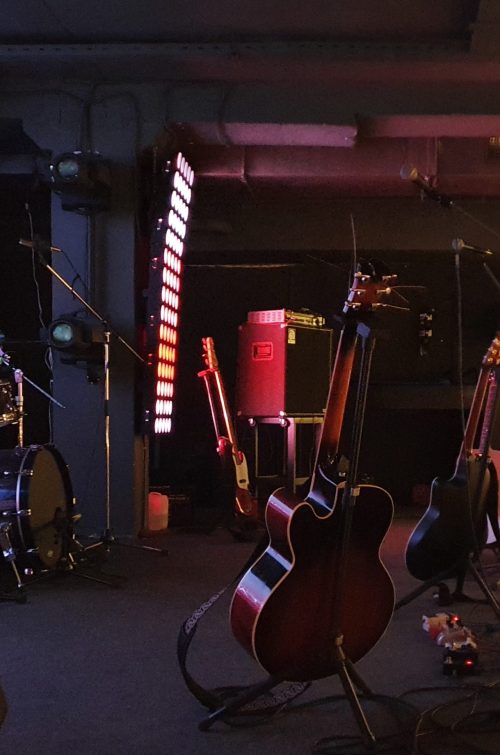 A stage with musical instruments and lighting